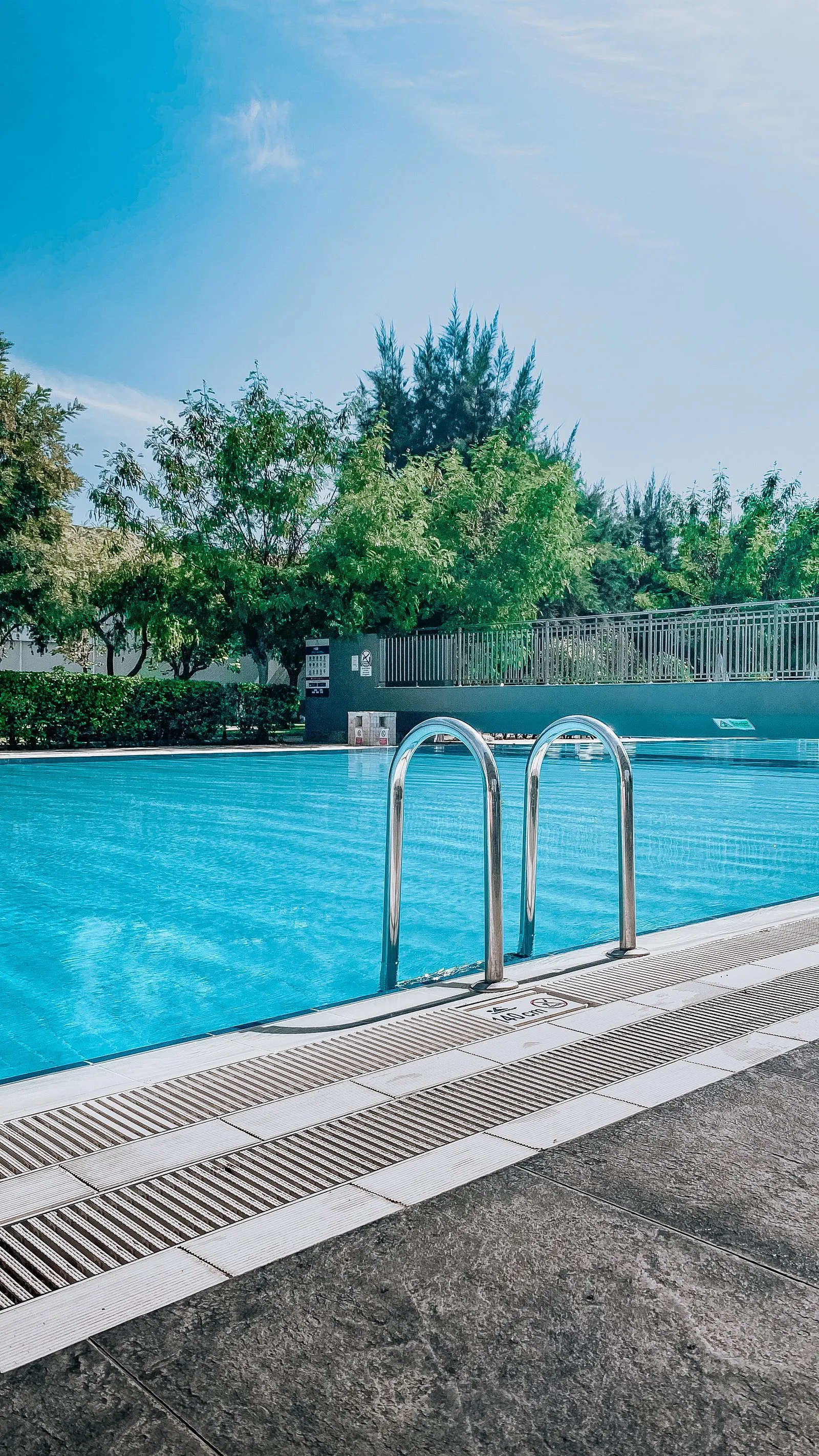 A compliant backyard pool safety barrier